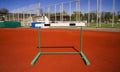 sports barrier. Red treadmills at the stadium. Red racetracks on the sports arena.