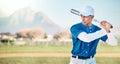 Sports, baseball and man with bat in action ready to hit ball in game, practice and competition on field. Fitness, sport Royalty Free Stock Photo