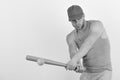 Sports and baseball training concept. Guy in grey tank top Royalty Free Stock Photo