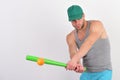 Sports and baseball training concept. Guy in grey tank top Royalty Free Stock Photo