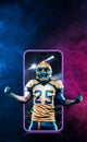 American football player. Sports betting on american football. Sportsman with ball in helmet on stadium in action. Bets Royalty Free Stock Photo