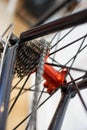 Sports bicycle red rear axle with racing cassette gears Royalty Free Stock Photo