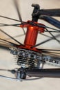 Sports bicycle red rear axle with racing cassette gears Royalty Free Stock Photo