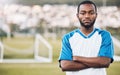 Sports, black man and portrait of soccer player on field, focus and motivation for winning game in Africa. Confident Royalty Free Stock Photo