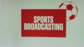 Sports Broadcasting appearing inscription on red and white background with football ball symbol. Sports concept