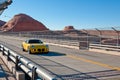 Sports car on desert highway Royalty Free Stock Photo