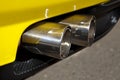 Sports car exhaust pipe Royalty Free Stock Photo