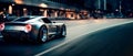 Sports car riding on a city road at night. street race Car in fast motion. Fast-moving car at night. Fast-moving supercar on the