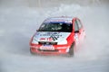 Sports car turns into a skid on the icy track