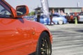 Sports car and Used cars, parked in the parking lot of Dealership waiting to be sold and delivered to customers and waiting for Royalty Free Stock Photo