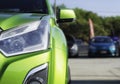 Sports car and Used cars, parked in the parking lot of Dealership waiting to be sold and delivered to customers and waiting for Royalty Free Stock Photo