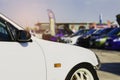 Sports car and Used cars, parked in the parking lot of Dealership waiting to be sold and delivered to customers and waiting for Royalty Free Stock Photo