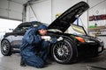 Sports car in a workshop Royalty Free Stock Photo