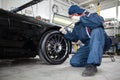 Sports car in a workshop Royalty Free Stock Photo