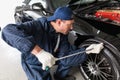 Sports car in a workshop Royalty Free Stock Photo