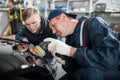 Sports car in a workshop Royalty Free Stock Photo