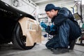 Sports car in a workshop Royalty Free Stock Photo