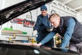 Sports car in a workshop Royalty Free Stock Photo