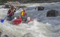 Sports catamaran in the rapids.