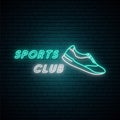 Sports club neon light signboard. Glowing neon sneaker emblem.