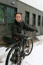 Sports concept, young woman riding a sports bike in winter Royalty Free Stock Photo