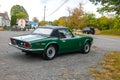 Sports coupe Triumph Spitfire Mark IV for sale by the side of the road. Offer for connoisseurs of retro cars