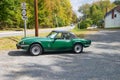 Sports coupe Triumph Spitfire Mark IV for sale by the side of the road. Offer for connoisseurs of retro cars