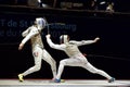 Sports duel of two fencers Royalty Free Stock Photo