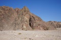 Tourists horse riders and a lone camel in the vicinity of the Malakot Mountain Oasis, Dahab, South Sinai Governorate, Egypt