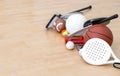 Sports equipment, rackets and balls on hardwood court floor. Horizontal education and sport poster, greeting cards, headers, websi Royalty Free Stock Photo