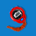 Sports equipment - Red Stopwatch blue background Royalty Free Stock Photo