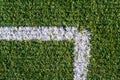 Sports field with artificial grass and white markings