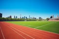 sports field bathed in sunlight on a beautiful day, with a scenic urban skyline in the background.