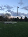 Sports field at dusk, early spring