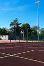 Sports field with lighting mast