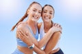 Sports, fitness friends or woman hug for support, motivation and teamwork on outdoor blue sky mock up sunshine lens