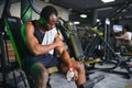 Sports, fitness, healthy lifestyle. African man in the gym. Royalty Free Stock Photo