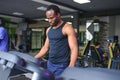 Sports, fitness, healthy lifestyle. African man in the gym. Royalty Free Stock Photo