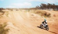 Sports, fitness and person with motorcycle, speed and action with power in desert, race or rally with athlete outdoor