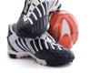 Sports footwear and soccer ball Royalty Free Stock Photo