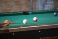 Sports game of billiards on a green cloth. Billiard balls with numbers on a pool table. Royalty Free Stock Photo