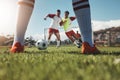 Sports game, football field action and legs of soccer player in competition, fitness practice or cardio health workout Royalty Free Stock Photo
