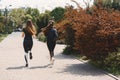 Sports girls training in a summer forest Royalty Free Stock Photo