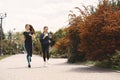 Sports girls training in a summer forest Royalty Free Stock Photo