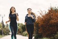 Sports girls training in a summer forest Royalty Free Stock Photo