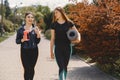 Sports girls training in a summer forest Royalty Free Stock Photo