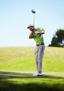 Sports, golf swing and black man with stroke in game, match and competition on golfing course. Recreation, hobby and Royalty Free Stock Photo