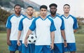 Sports group, soccer ball and portrait of team on field for fitness training or game outdoor. Football player, club and Royalty Free Stock Photo