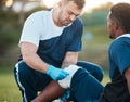 Sports, injury and man on field with bandage for accident, emergency and first aid for muscle sprain. Fitness Royalty Free Stock Photo