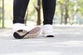 Sports injury. Woman with pain in ankle while jogging Royalty Free Stock Photo